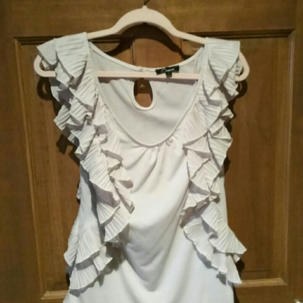 Cream colored double ruffle statement piece top